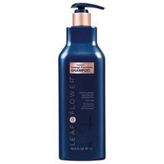 Front view of Leaf and Flower Instant Damage Correction Shampoo 33.6 oz liter bottle against a clean background.